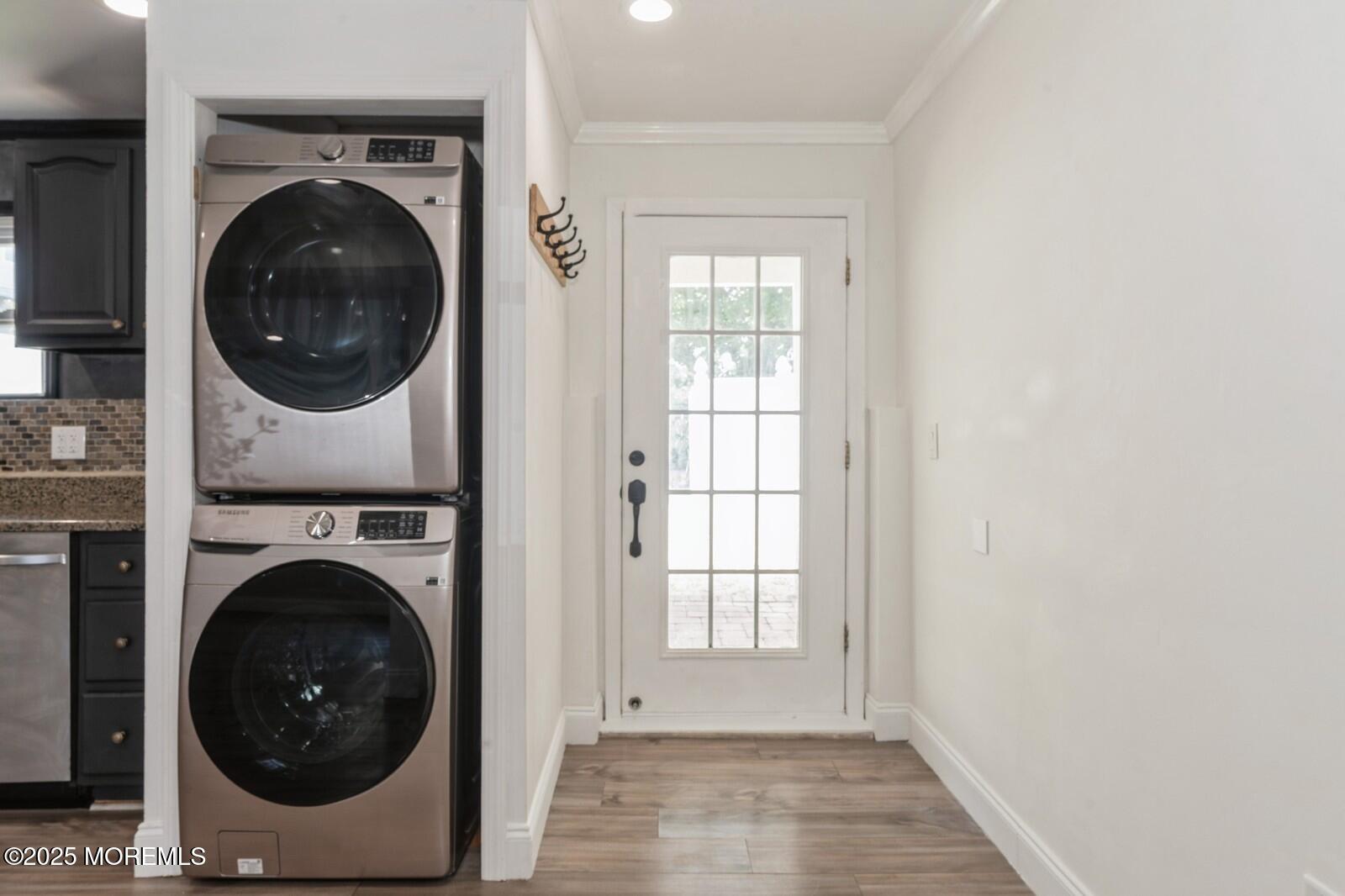 52 Atlantic Street, Unit 2 Highlands, NJ 07732 - Photo 10 of 35 a view of a hallway with washer and dryer