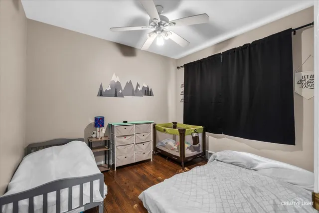 a bedroom with furniture and a window