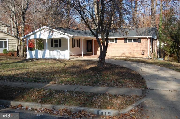 8419 Thames Street Springfield, VA 22151 - Photo 2 of 14 a front view of a house with a yard