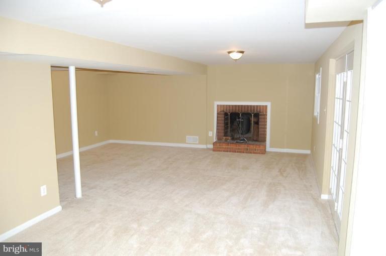 8419 Thames Street Springfield, VA 22151 - Photo 12 of 14 a view of an empty room with a window