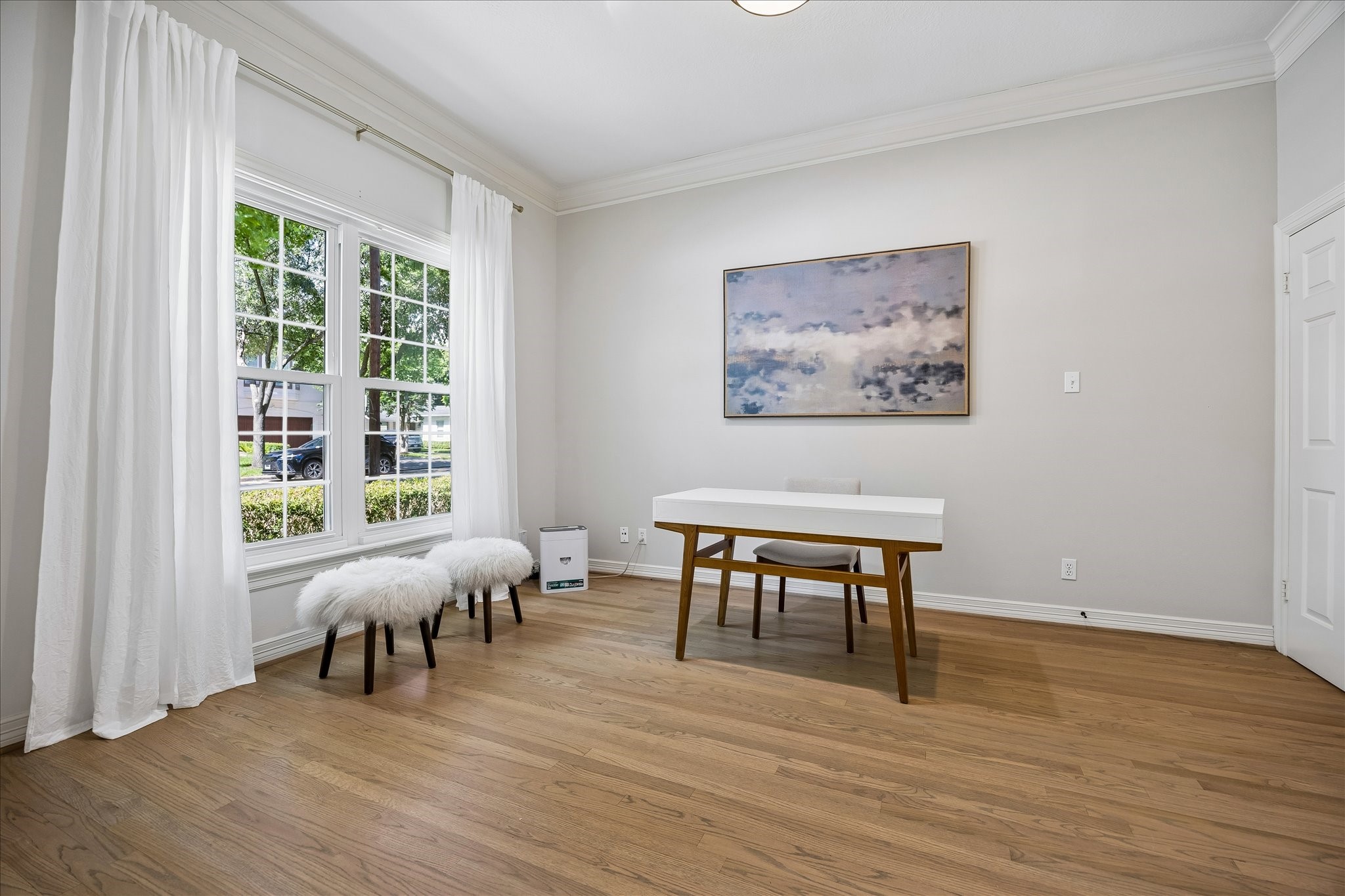 4131 Sunset Boulevard Houston, TX 77005 - Photo 7 of 38 a view of a livingroom with furniture window and wooden floor