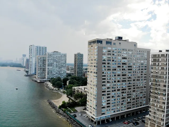 a view of a city with tall buildings