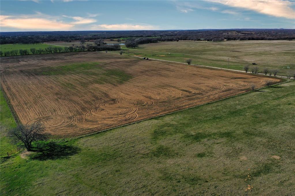 1300 Baseline Road Hennepin, OK 73444 - Photo 4 of 4 Expansive acreage featuring cultivated land and surrounding green pastures