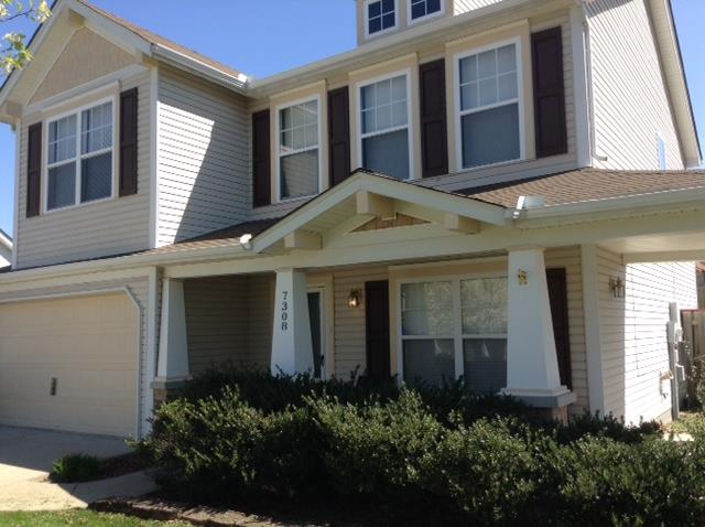 7308 Middlebrook Circle Nashville, TN 37221 - Photo 1 of 20 a view of a white building among the plants