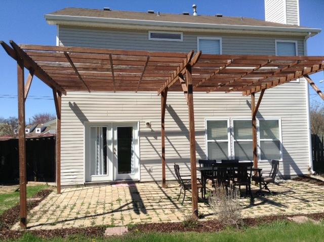 7308 Middlebrook Circle Nashville, TN 37221 - Photo 18 of 20 a front view of a house with patio