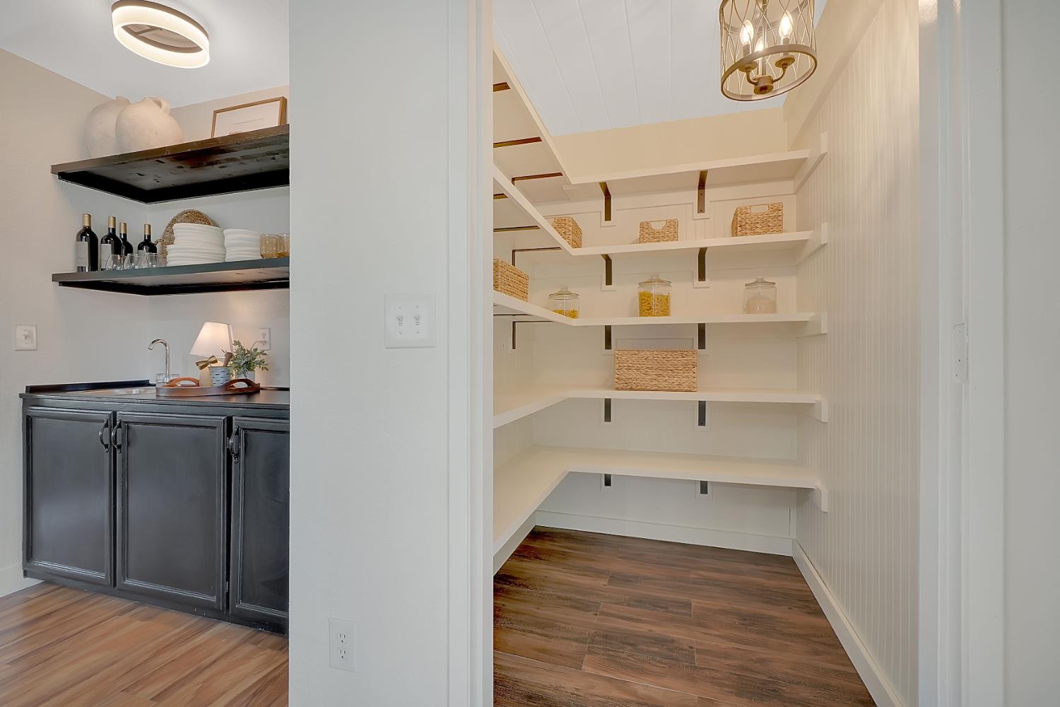 513 Perry Street Jackson, CA 95642 - Photo 21 of 56 a view of walk in closet with clothes and shoes