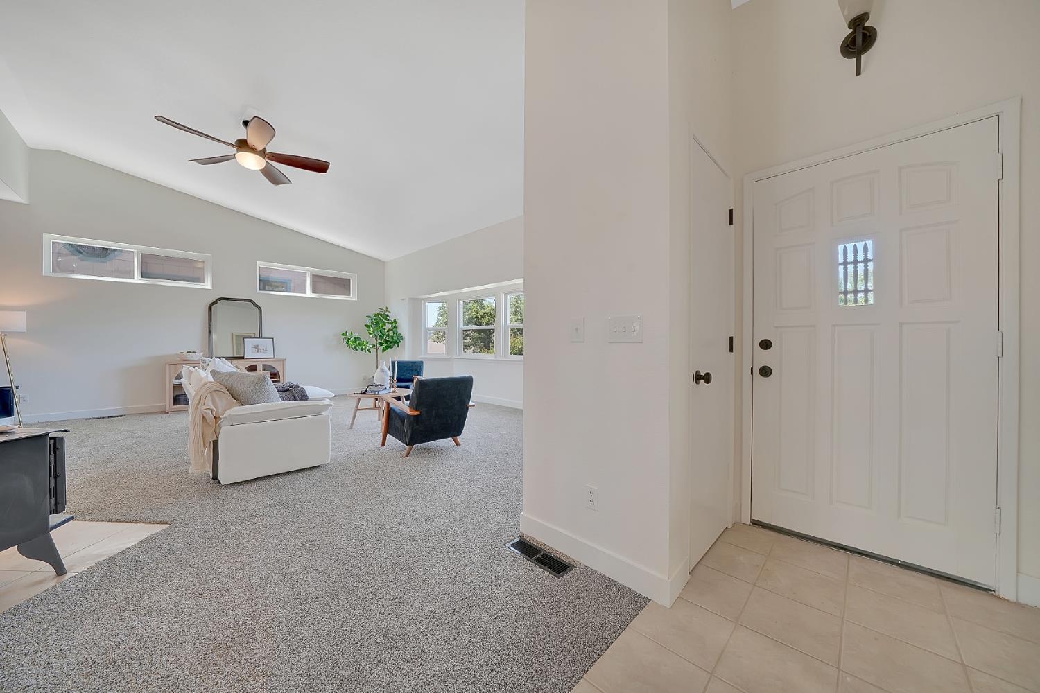 513 Perry Street Jackson, CA 95642 - Photo 24 of 56 a living room with furniture and a ceiling fan