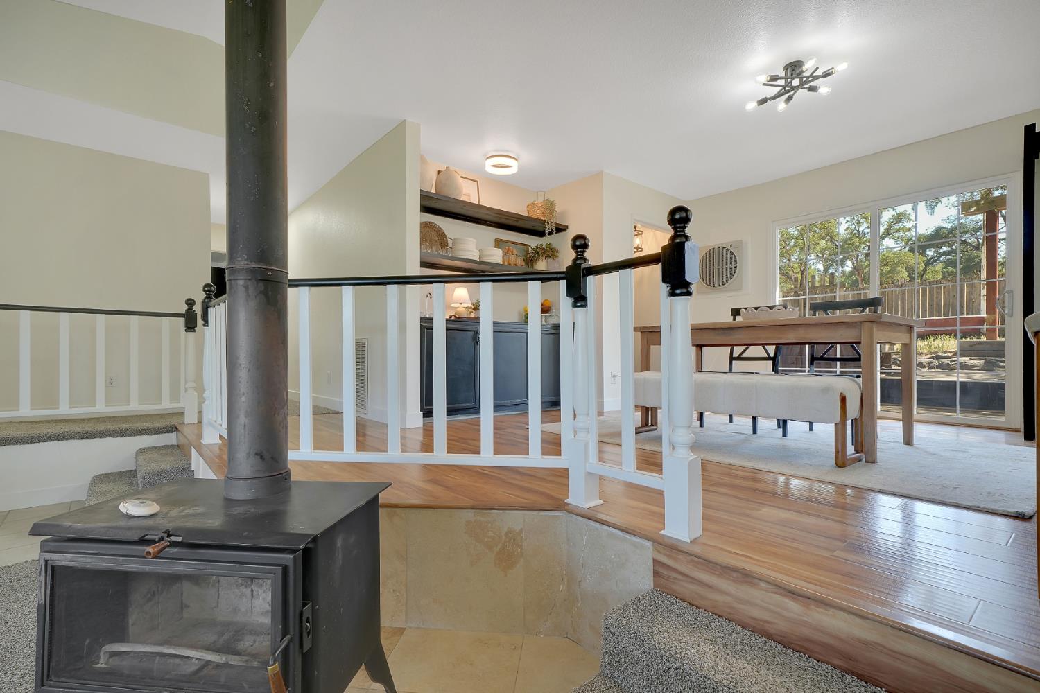 513 Perry Street Jackson, CA 95642 - Photo 32 of 56 a living room with lots of furniture and a wooden floor