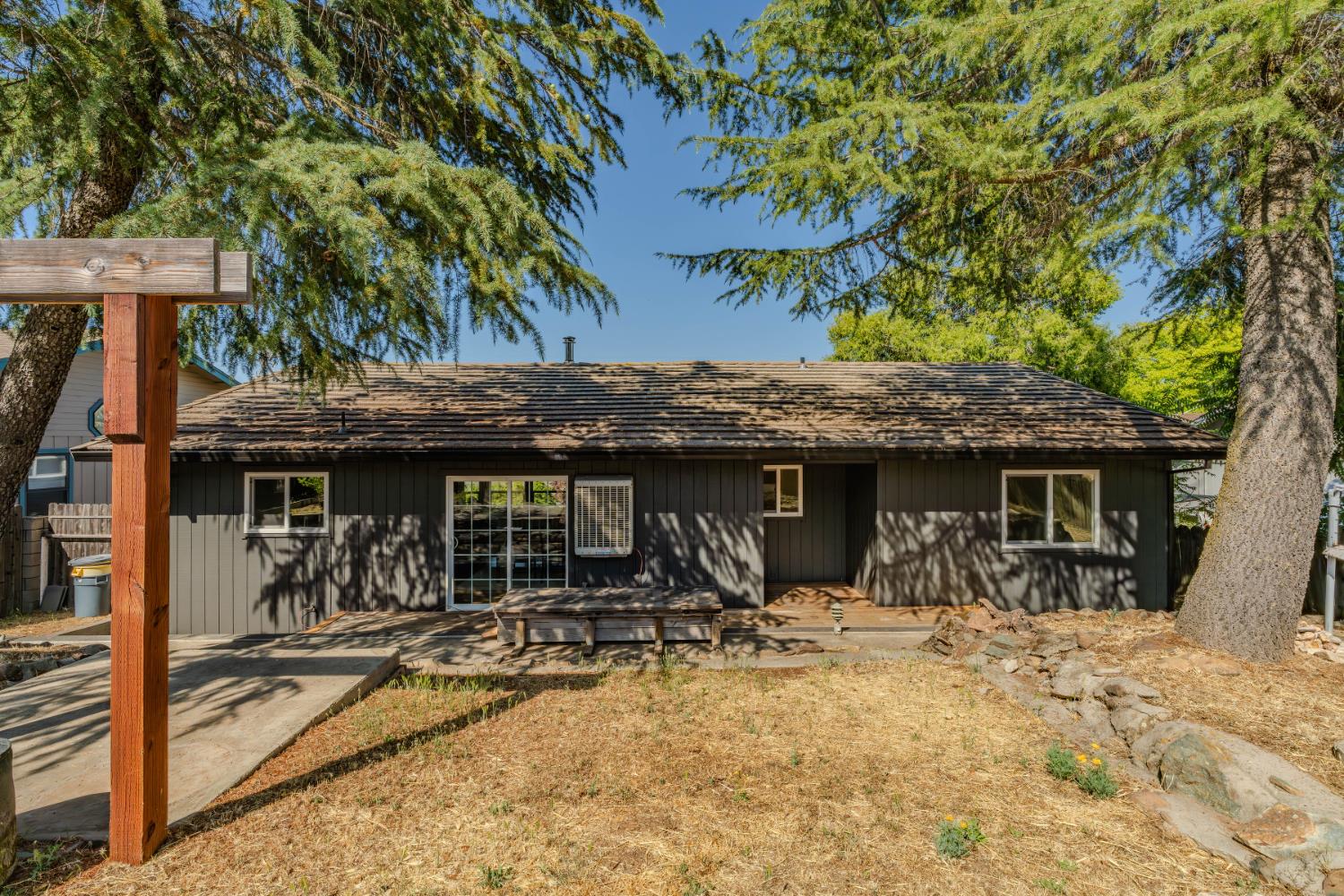 513 Perry Street Jackson, CA 95642 - Photo 50 of 56 a view of the house with backyard porch and sitting area