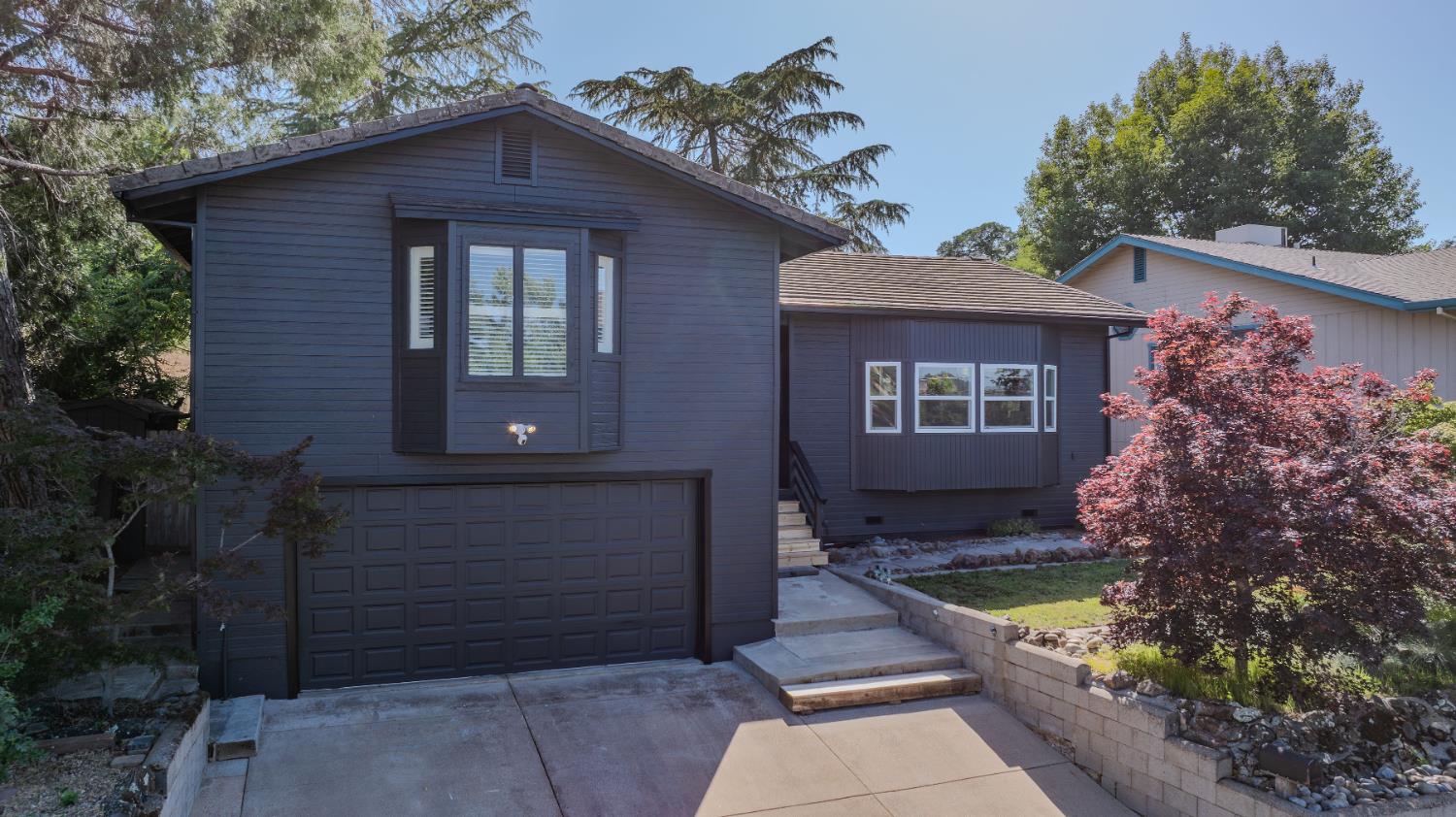 513 Perry Street Jackson, CA 95642 - Photo 54 of 56 a front view of a house with a garden