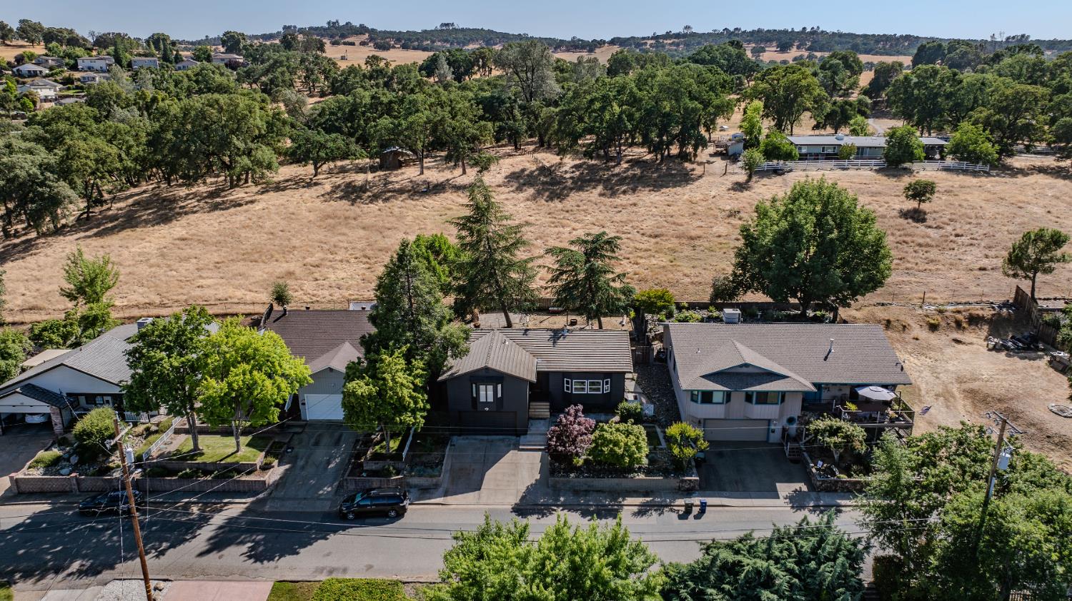 513 Perry Street Jackson, CA 95642 - Photo 56 of 56 an aerial view of a house with a yard and lake view