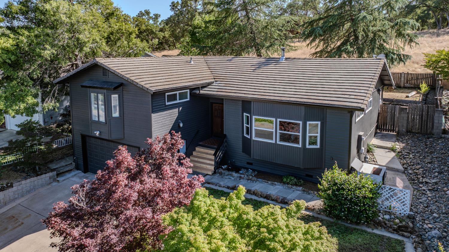 513 Perry Street Jackson, CA 95642 - Photo 8 of 56 a front view of a house with a yard