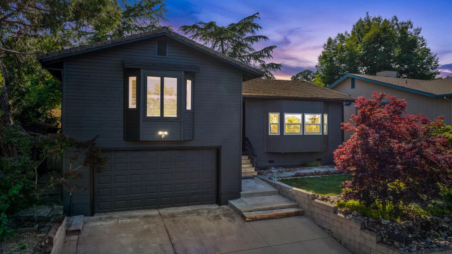 513 Perry Street Jackson, CA 95642 - Photo 9 of 56 a front view of a house with a yard