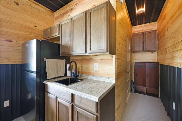 a bathroom with a sink and mirror