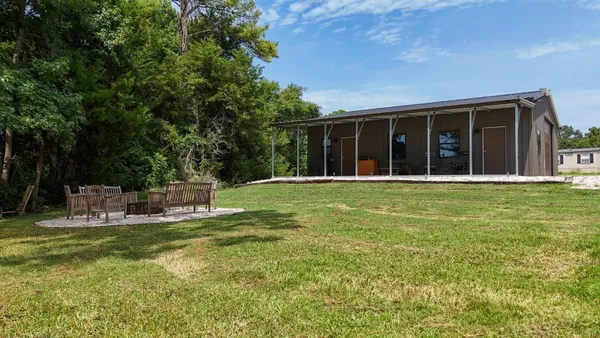 a garden view with a sitting space