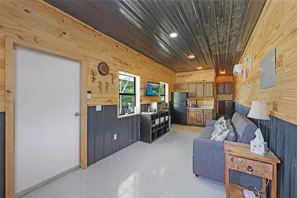 a outdoor living space with furniture and a couch