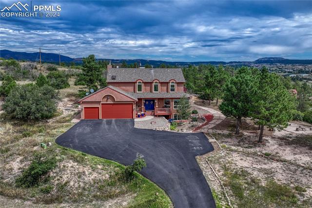 2690 Spaatz Road Monument, CO 80132 - Photo 42 of 50 View of front of home with a mountain view