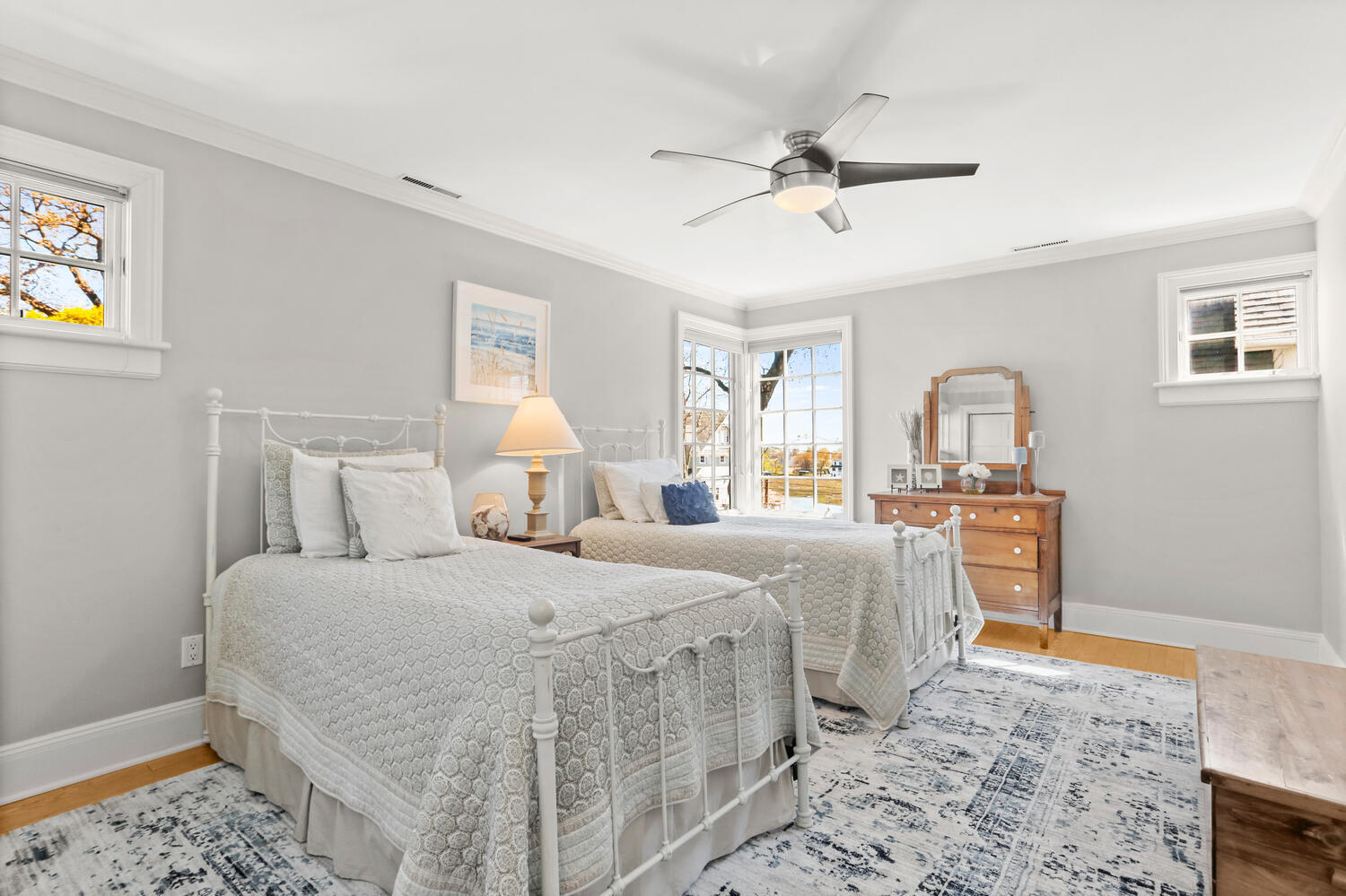 42 Pine Point Road Rowayton, CT 06853 - Photo 17 of 32 a bedroom with a bed and wooden floor