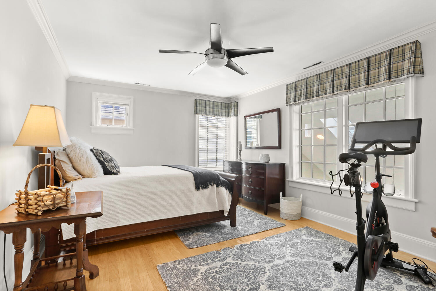 42 Pine Point Road Rowayton, CT 06853 - Photo 18 of 32 a bedroom with a bed and wooden floor