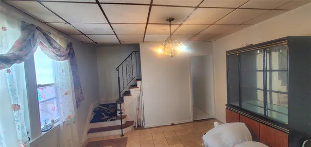 a view of entryway with stairs and wooden floor