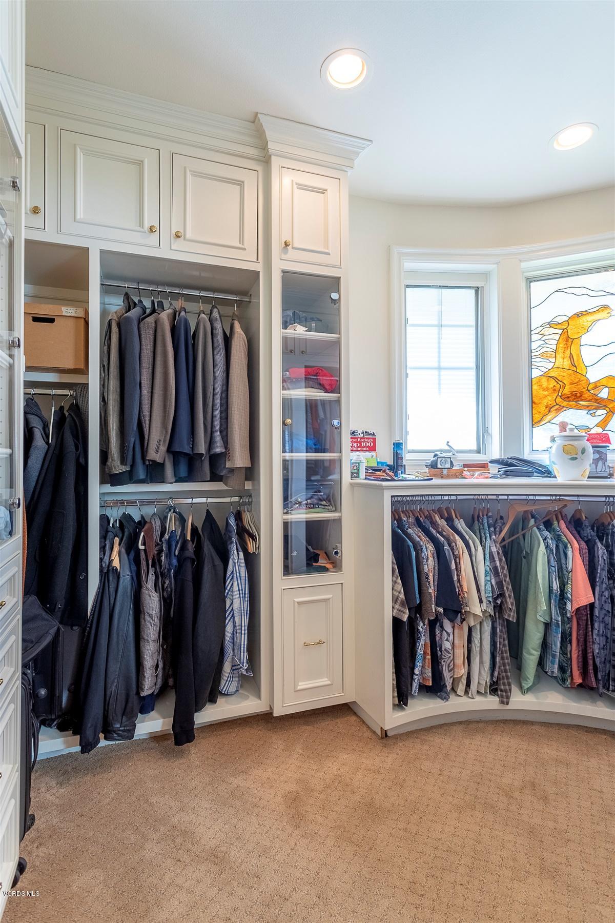 6933 Solano Verde Drive Somis, CA 93066 - Photo 31 of 58 a view of walk in closet with clothes and shoes