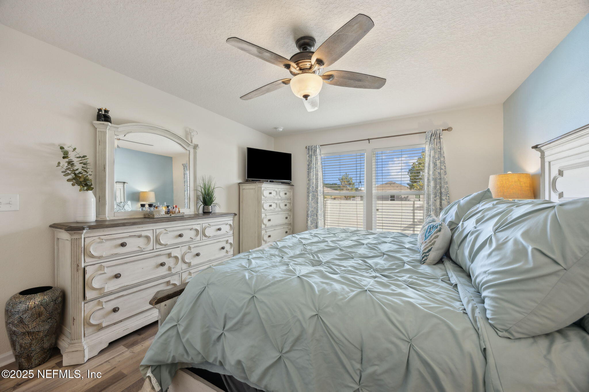 3356 Canyon Falls Drive Green Cove Springs, FL 32043 - Photo 18 of 66 a bedroom with a bed and a dresser
