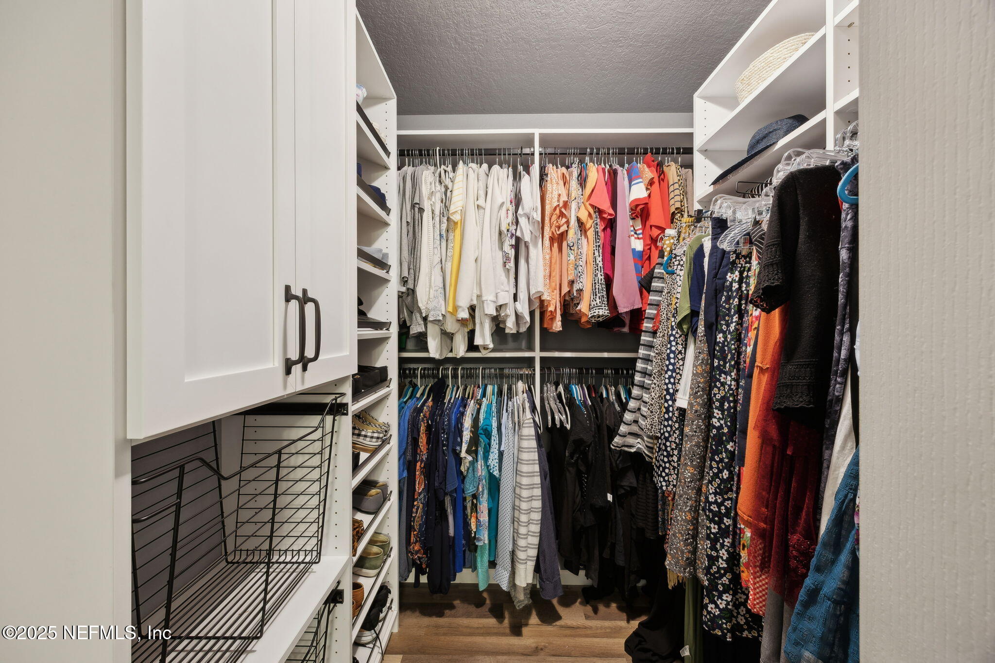 3356 Canyon Falls Drive Green Cove Springs, FL 32043 - Photo 20 of 66 a view of walk in closet with clothes