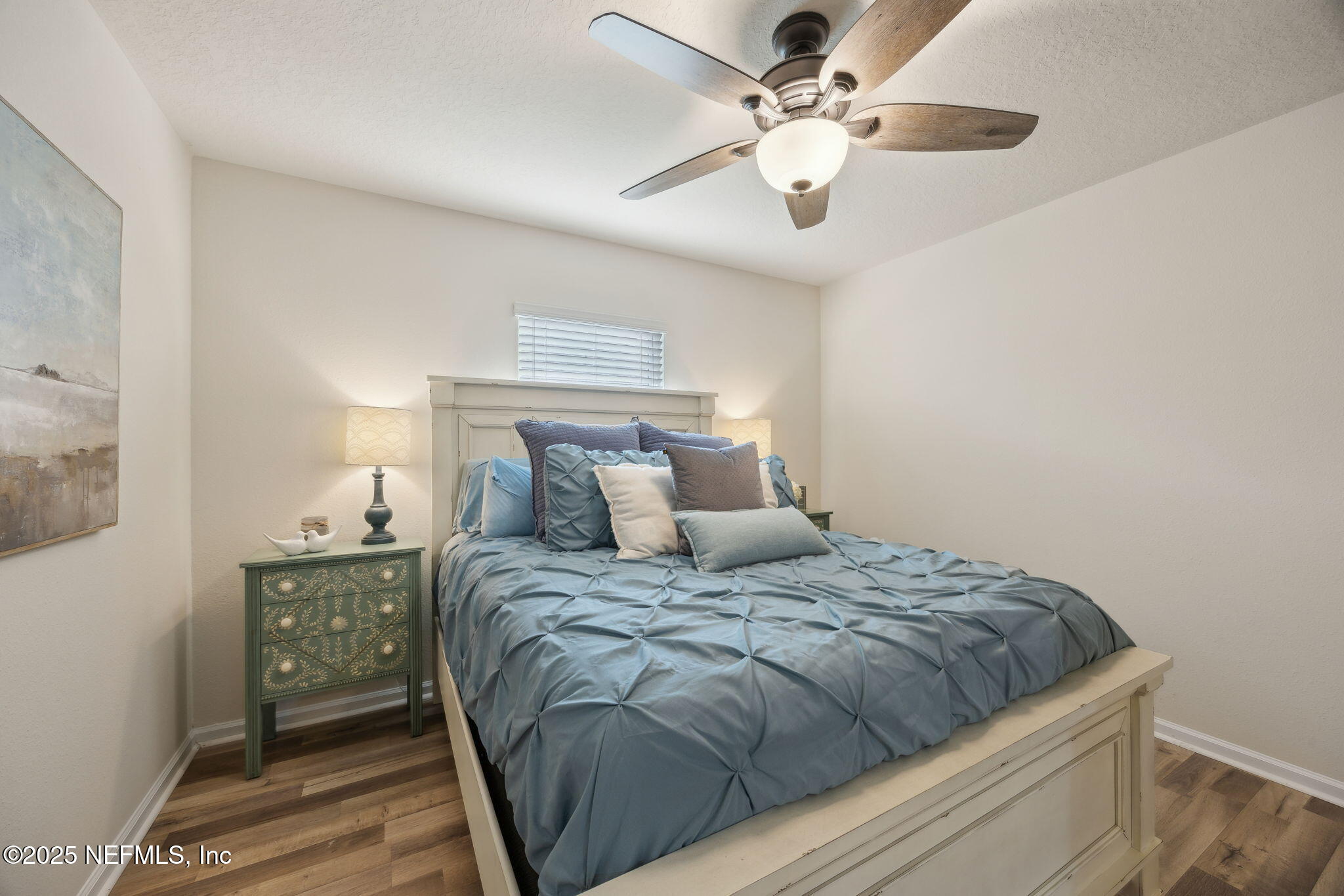 3356 Canyon Falls Drive Green Cove Springs, FL 32043 - Photo 22 of 66 a bedroom with a bed and a chandelier
