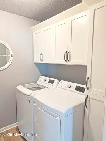 a bedroom with a bed and a closet