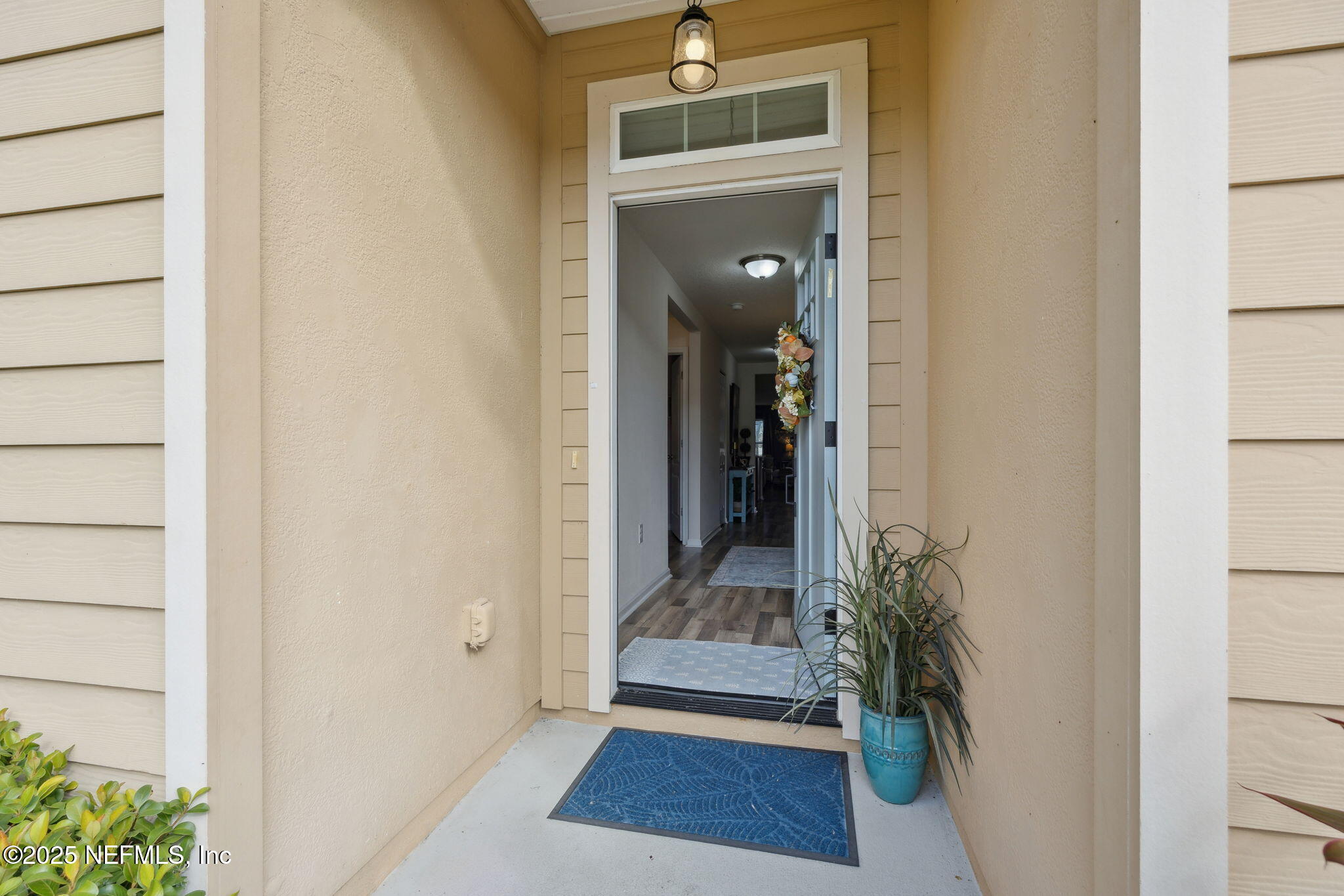 3356 Canyon Falls Drive Green Cove Springs, FL 32043 - Photo 3 of 66 a view of a hallway with a outdoor space