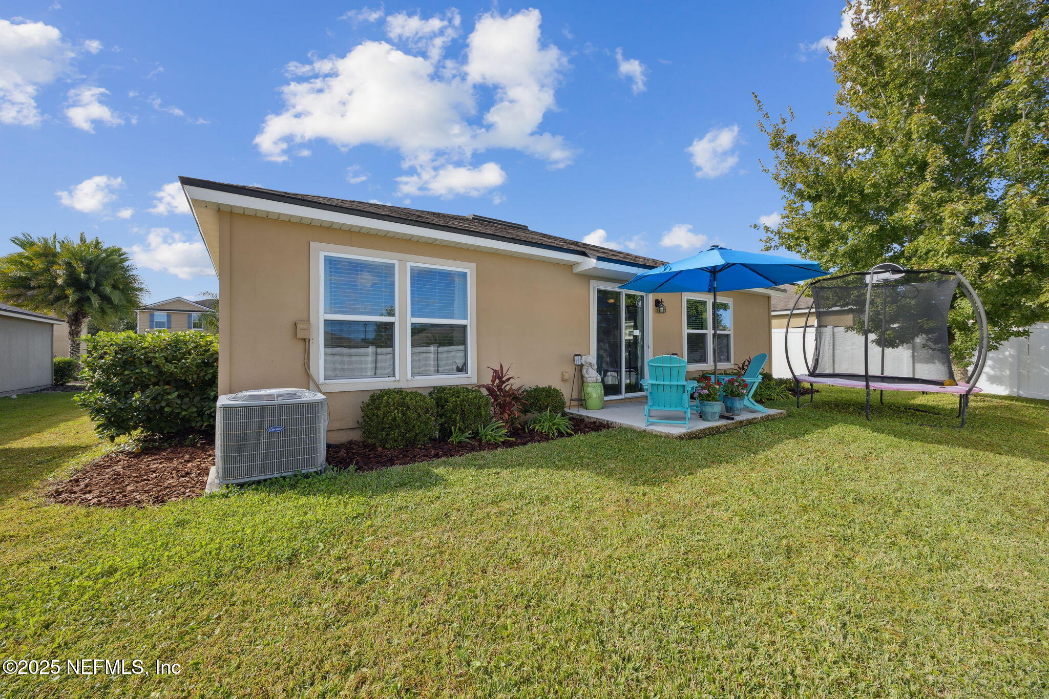 3356 Canyon Falls Drive Green Cove Springs, FL 32043 - Photo 31 of 66 a view of a house with backyard and sitting area