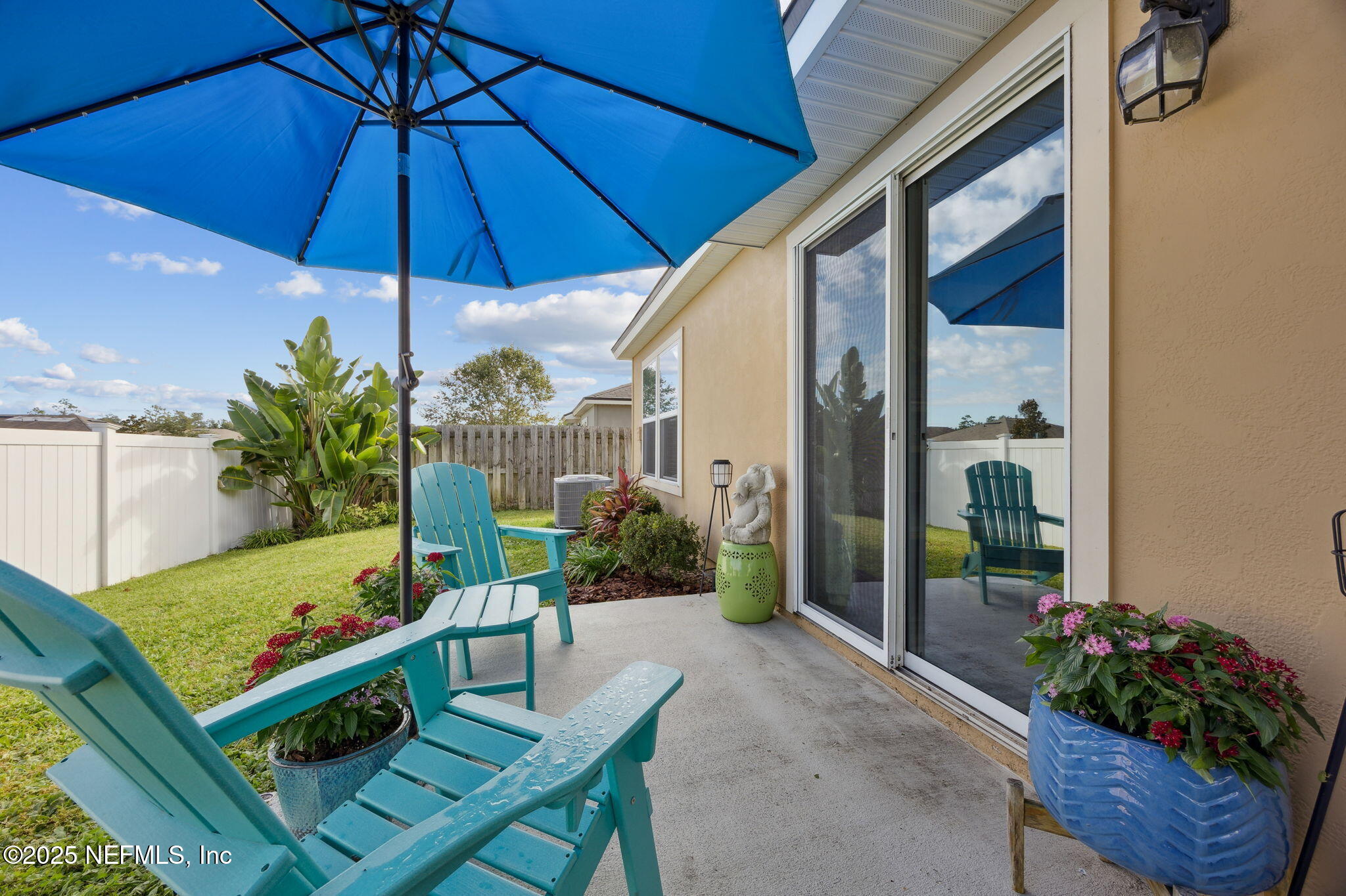 3356 Canyon Falls Drive Green Cove Springs, FL 32043 - Photo 34 of 66 a view of a balcony with chairs potted plants