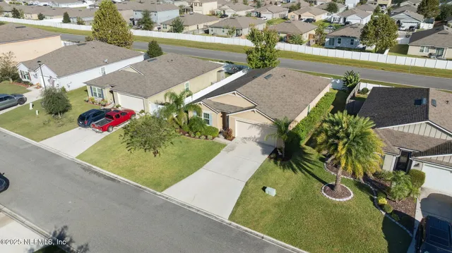 a view of outdoor space with playground and green space