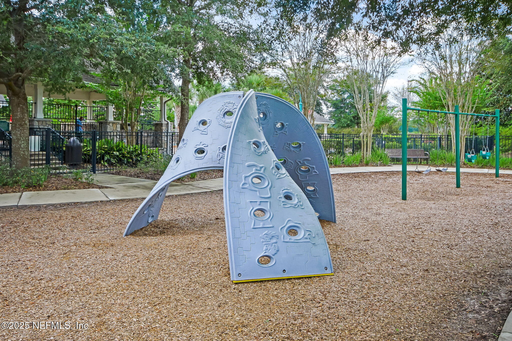 3356 Canyon Falls Drive Green Cove Springs, FL 32043 - Photo 57 of 66 a front view of a house with a yard