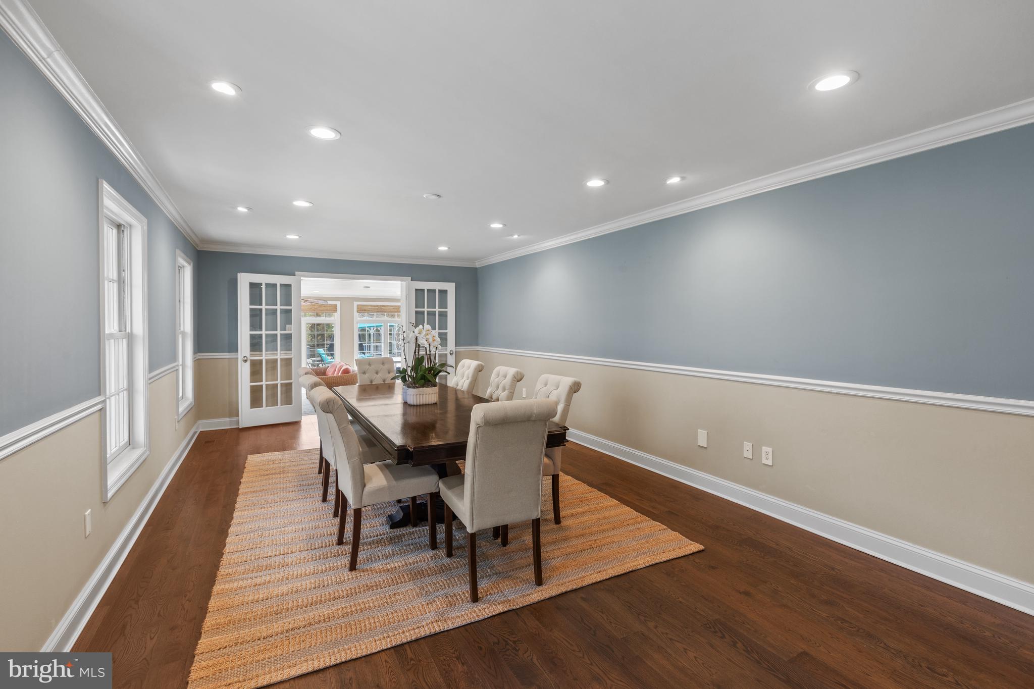 3054 Rundelac Road Annapolis, MD 21403 - Photo 13 of 49 a view of a dining room with furniture window and wooden floor