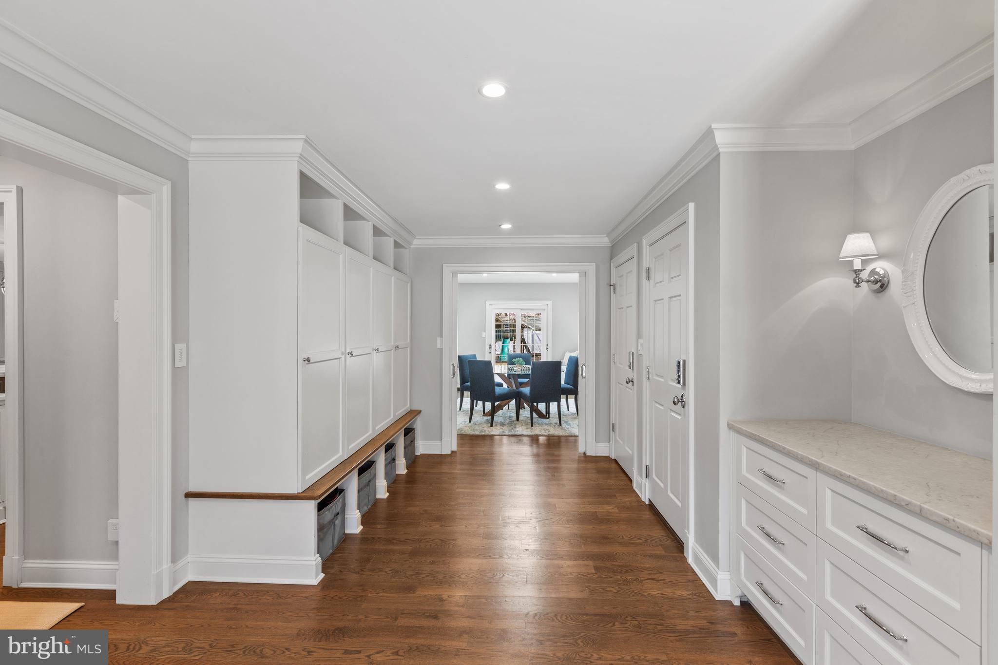 3054 Rundelac Road Annapolis, MD 21403 - Photo 14 of 49 a hallway with wooden floor windows and a livingroom