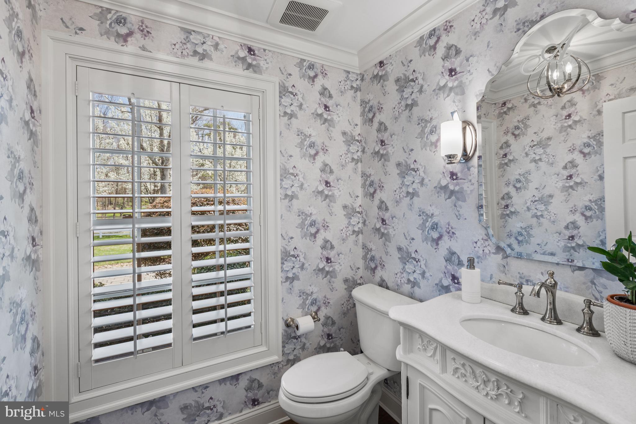 3054 Rundelac Road Annapolis, MD 21403 - Photo 15 of 49 a bathroom with a granite countertop sink toilet and shower