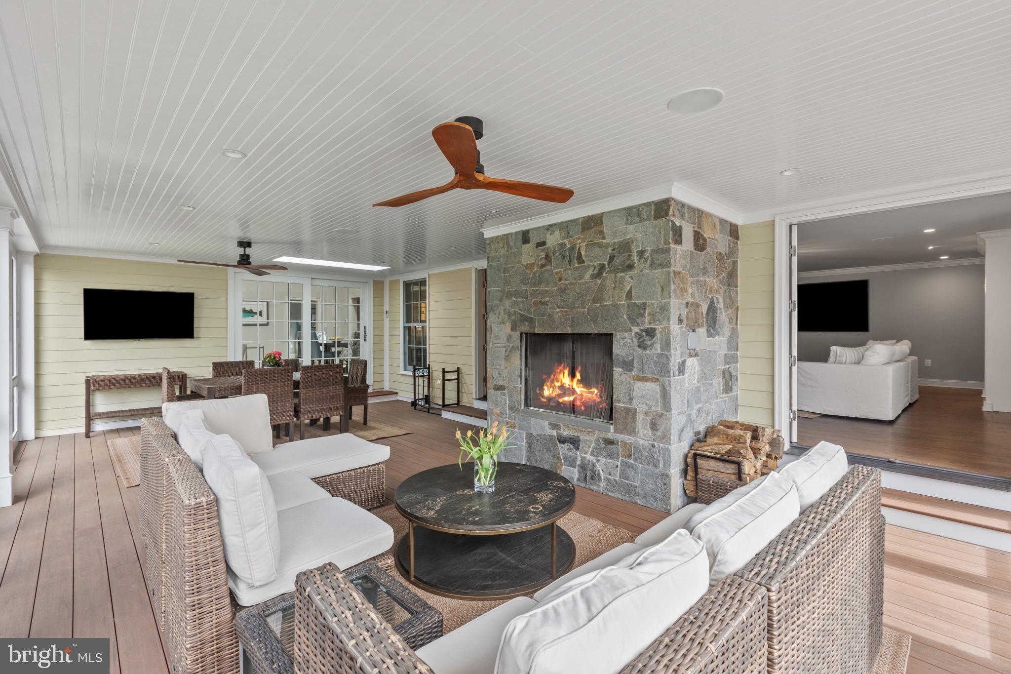 3054 Rundelac Road Annapolis, MD 21403 - Photo 17 of 49 a living room with furniture and a fireplace