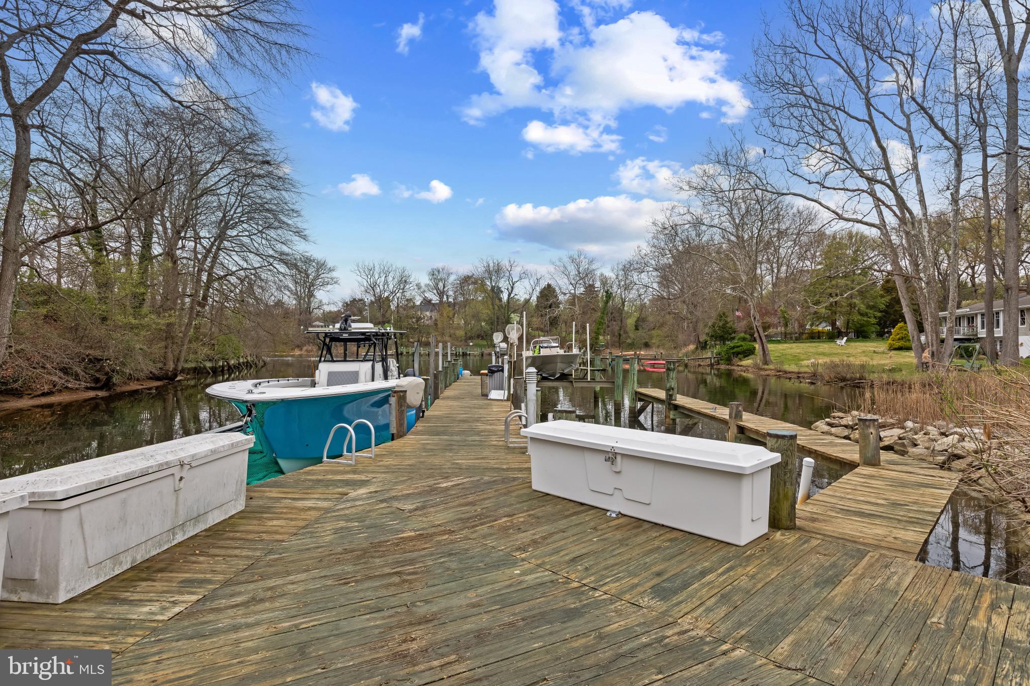 3054 Rundelac Road Annapolis, MD 21403 - Photo 42 of 49 a view of roof deck with couches and wooden floor
