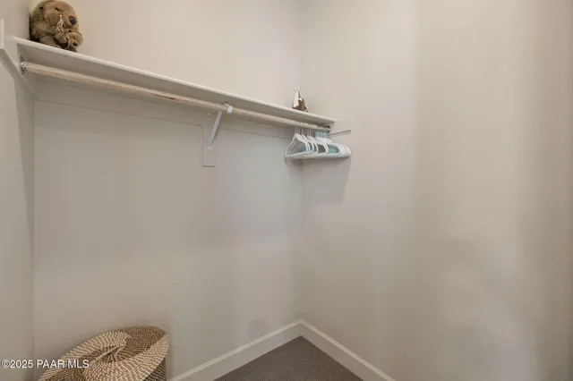 a view of small space with racks on the wall