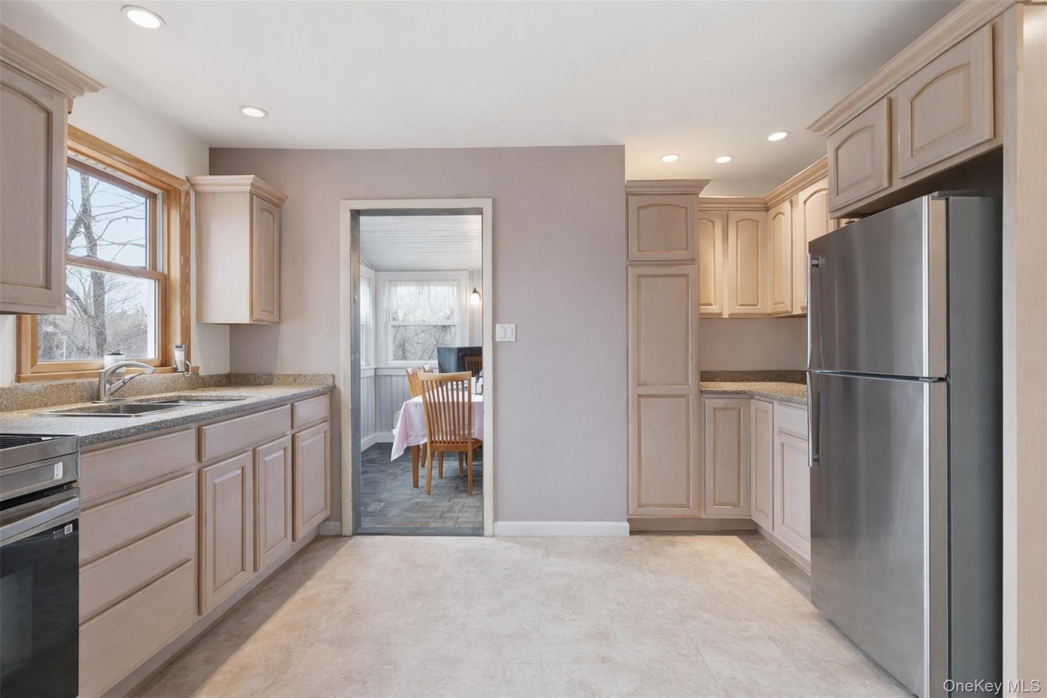 51 Johnson Street Lake Peekskill, NY 10537 - Photo 12 of 29 a kitchen with stainless steel appliances granite countertop a refrigerator and a sink
