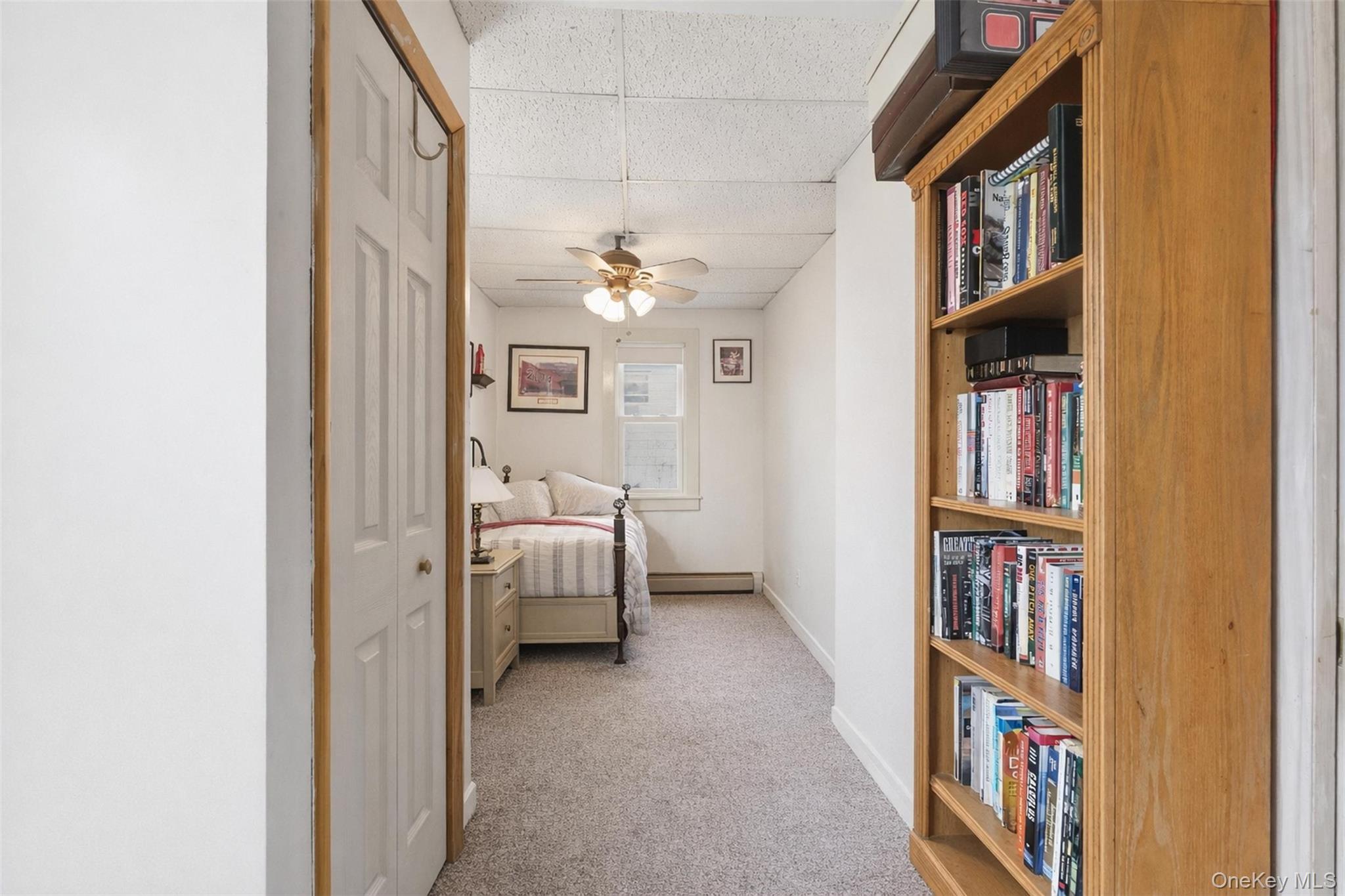51 Johnson Street Lake Peekskill, NY 10537 - Photo 19 of 29 a view of a livingroom with a bookshelf