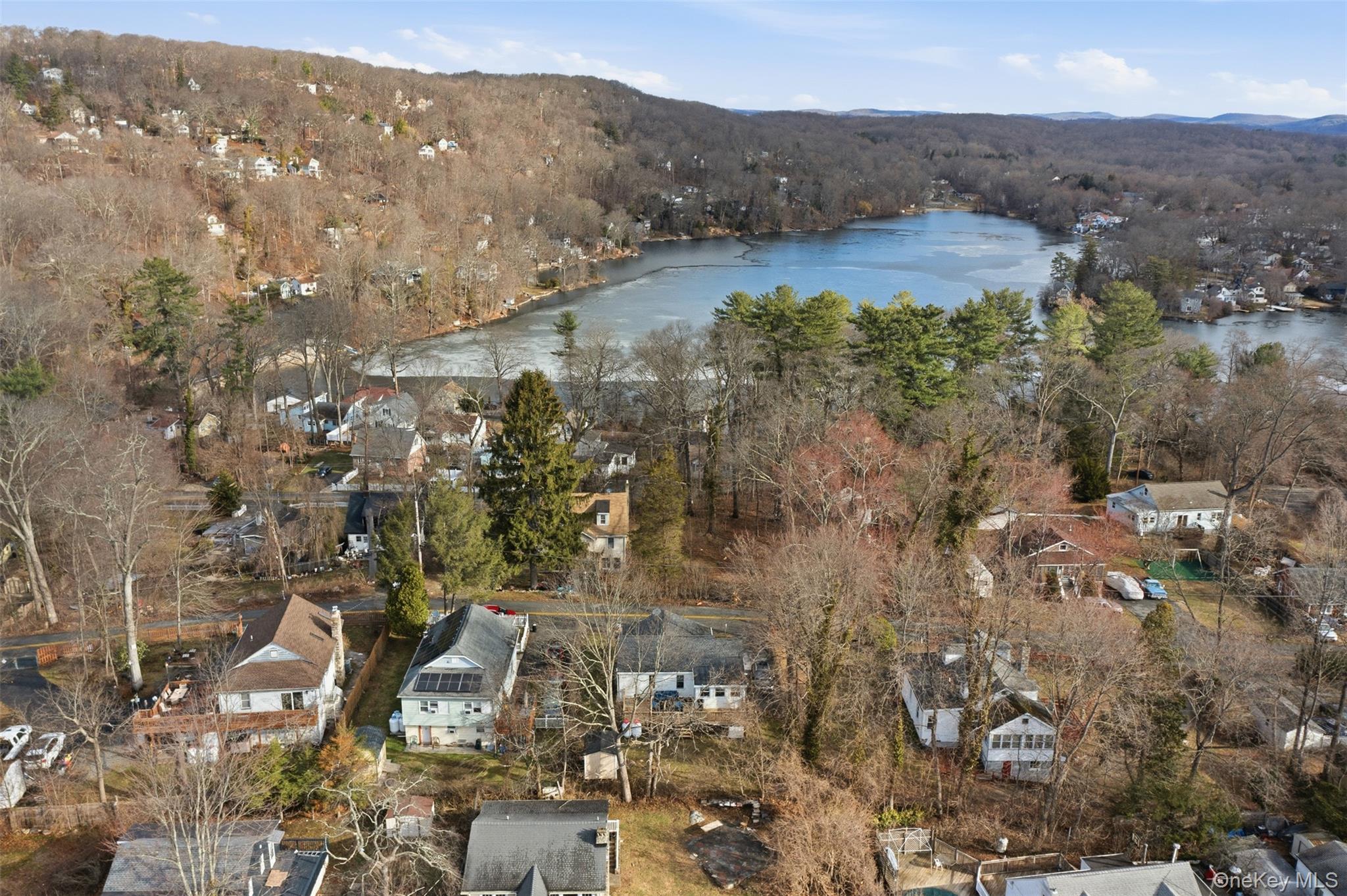 51 Johnson Street Lake Peekskill, NY 10537 - Photo 25 of 29 an aerial view of residential houses with outdoor space and trees