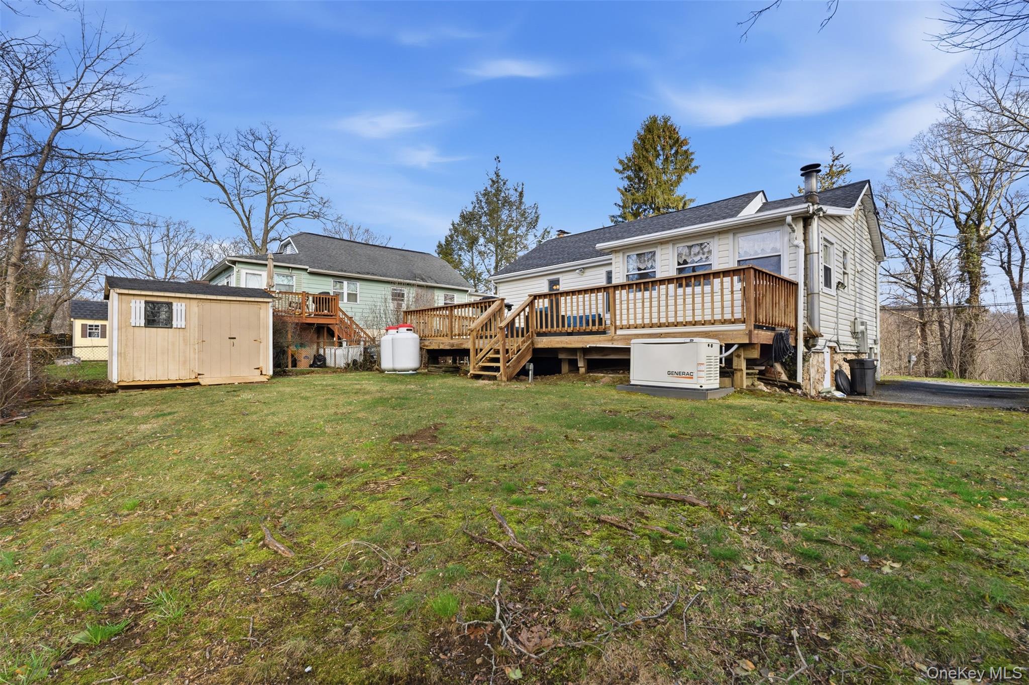 51 Johnson Street Lake Peekskill, NY 10537 - Photo 29 of 29 a view of a house with a yard