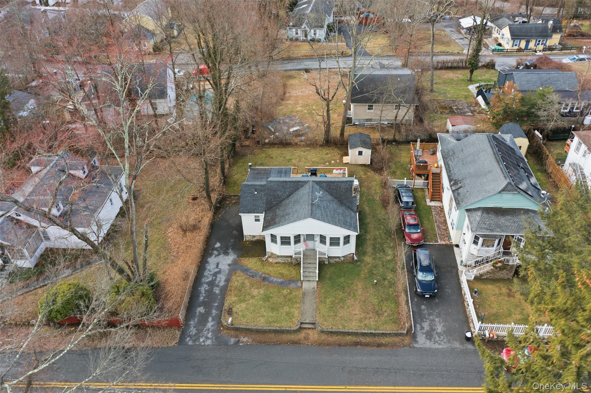 51 Johnson Street Lake Peekskill, NY 10537 - Photo 3 of 29 an aerial view of residential houses with outdoor space