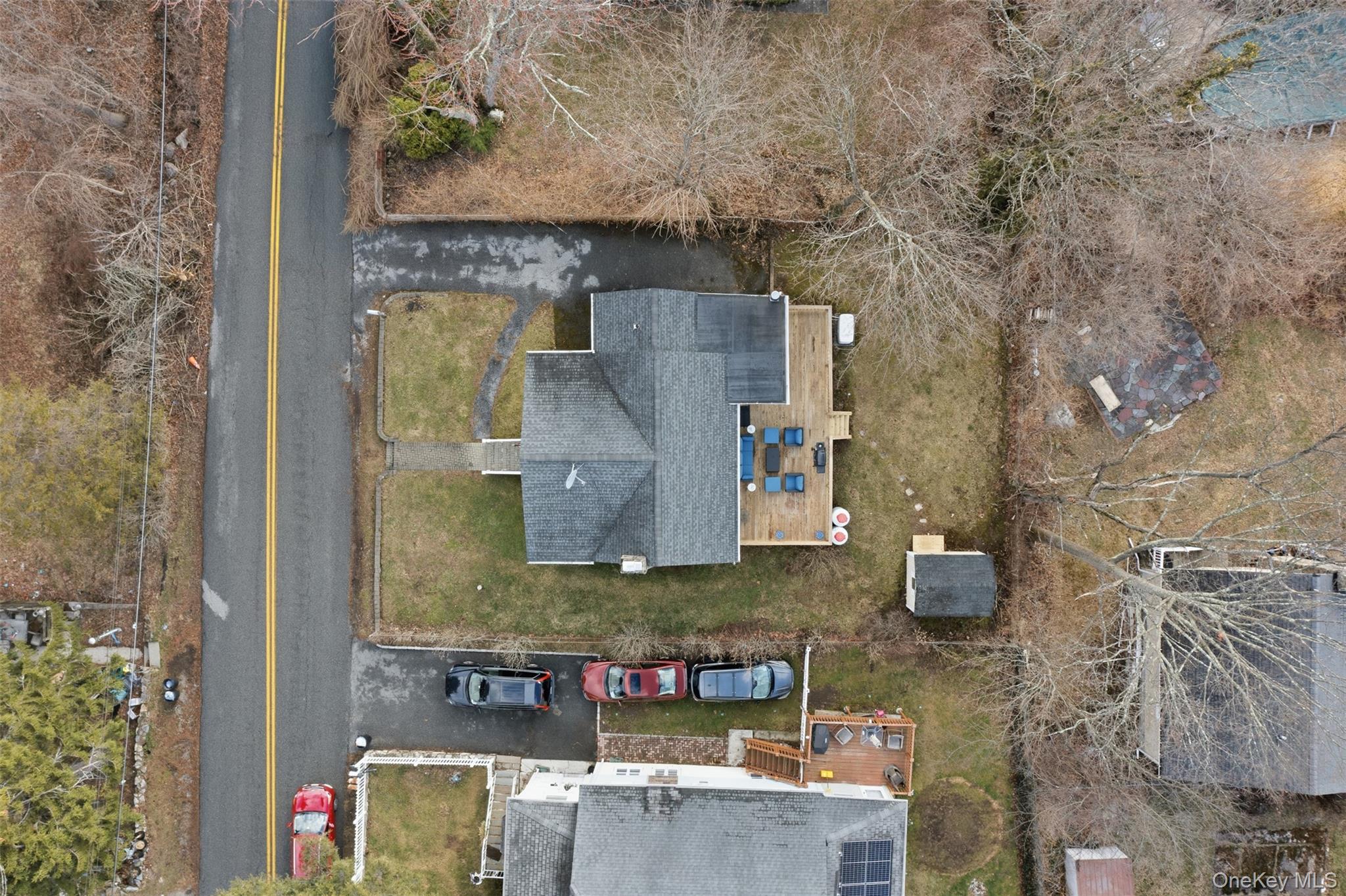 51 Johnson Street Lake Peekskill, NY 10537 - Photo 4 of 29 an aerial view of residential houses with outdoor space and parking