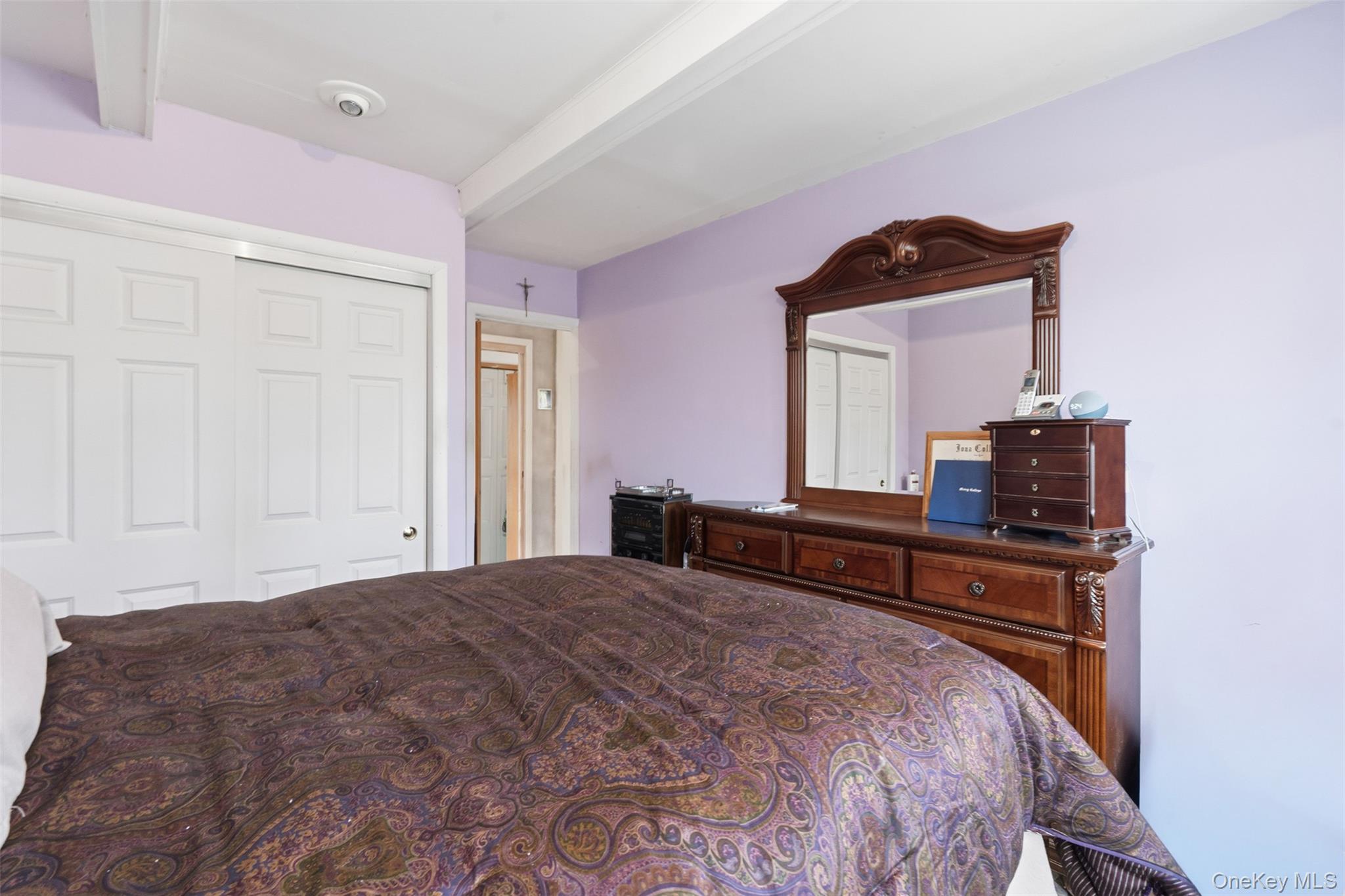 51 Johnson Street Lake Peekskill, NY 10537 - Photo 10 of 29 a bedroom with a bed and a dresser