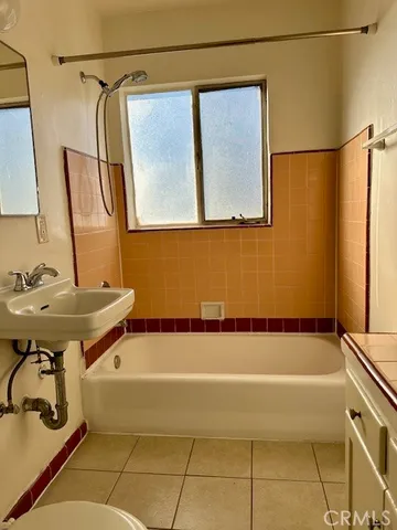 a bathroom with a sink and a tub
