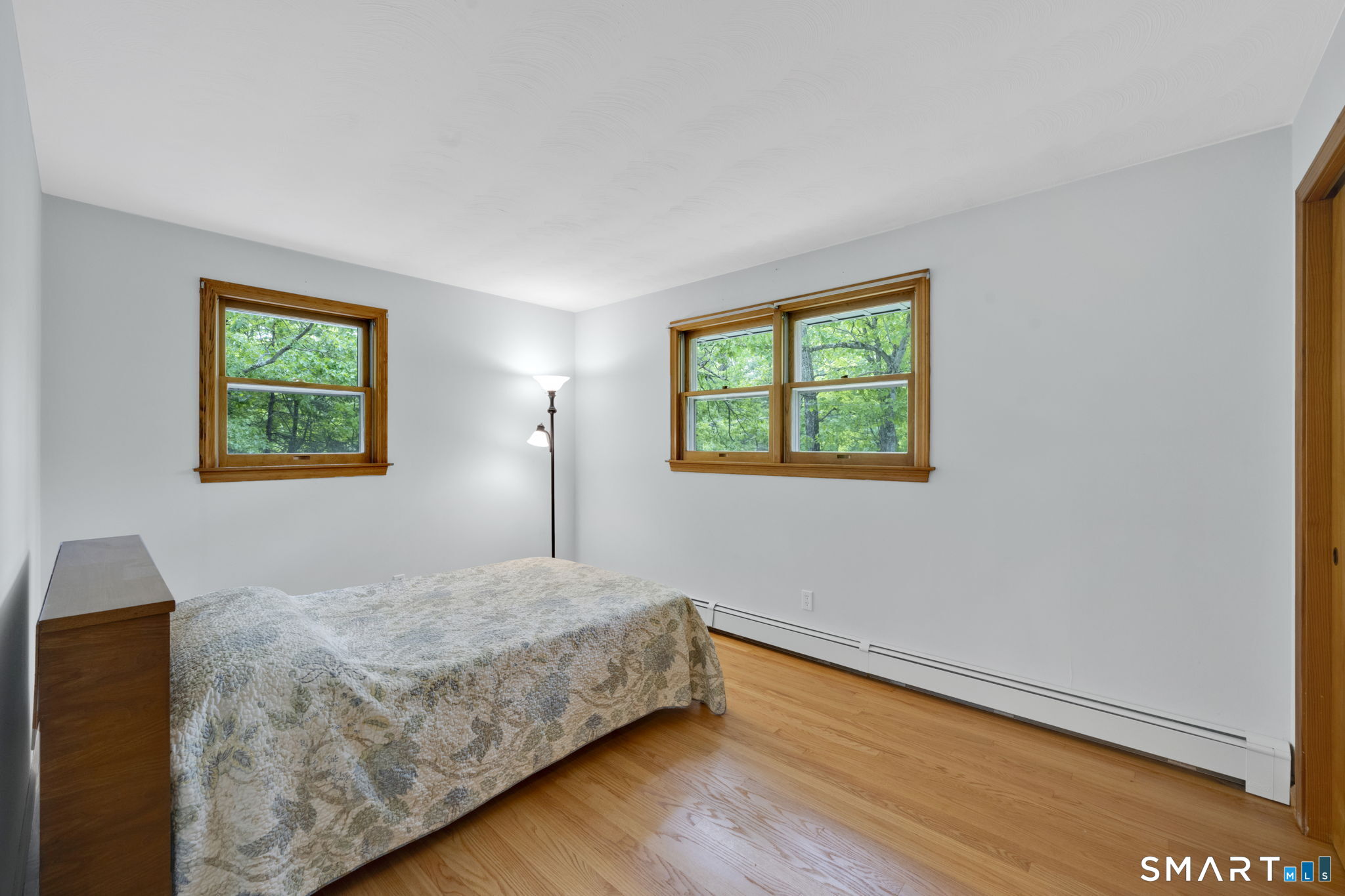 158 Notch Road Granby, CT 06035 - Photo 19 of 40 a bedroom with a bed and a window