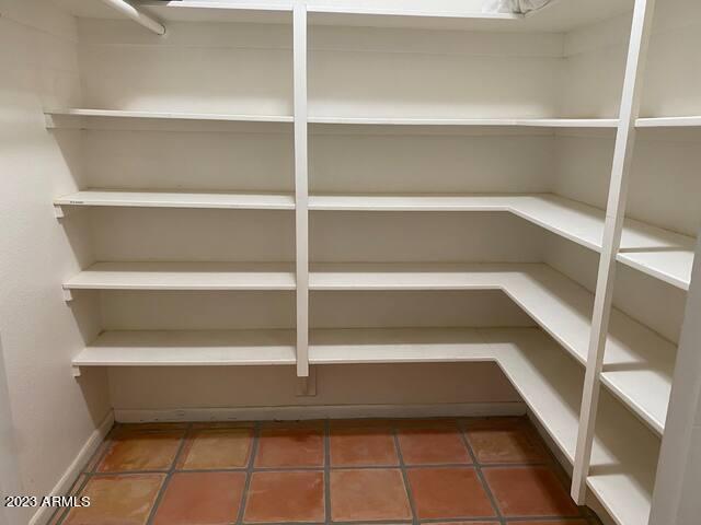 11222 North Miller Road Scottsdale, AZ 85260 - Photo 27 of 32 a view of a room with shelves